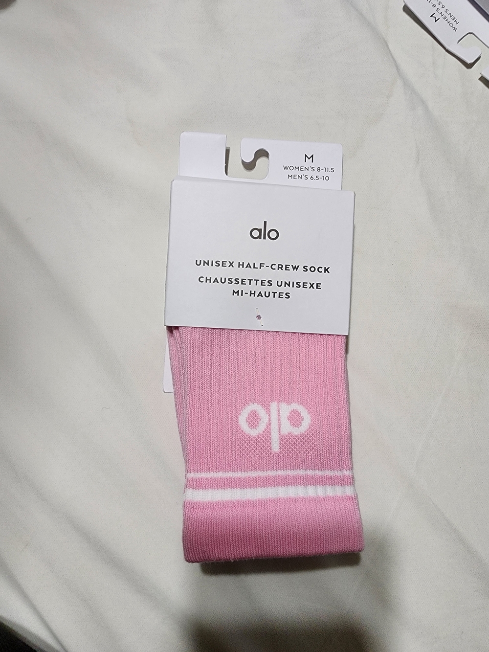 ALO Yoga Unisex Half-Crew Socks in Pink with White Accents